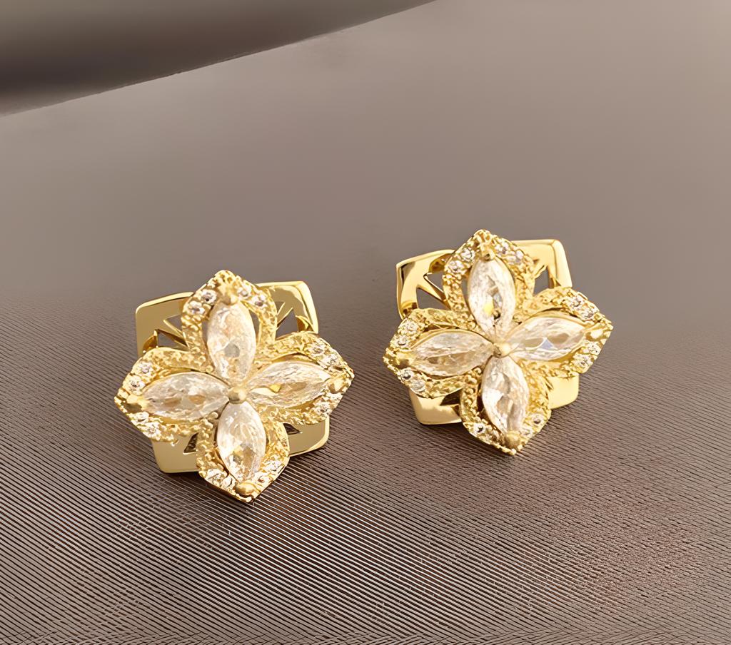 Aretes Flor Giratorio – Elegancia con Movimiento Hipnótico | Accesorio Original y Chic | MisterTodo Perú - MisterTodo