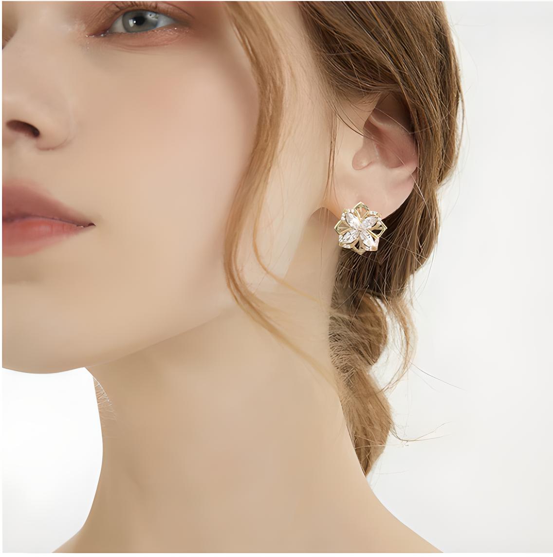 Aretes Flor Giratorio – Elegancia con Movimiento Hipnótico | Accesorio Original y Chic | MisterTodo Perú - MisterTodo